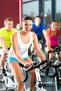 Young People Spinning in the gym Royalty Free Stock Photo