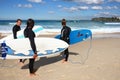 Young people surf Royalty Free Stock Photo