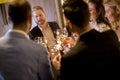 Young people toasting with white wine Royalty Free Stock Photo