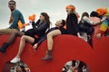 Young people on the top of the Iamsterdam sign in Amsterdam.