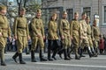 Young people in the uniform of the Second World War. Royalty Free Stock Photo