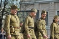 Young people in the uniform of the Second World War. Royalty Free Stock Photo