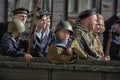 Young people in the uniform of the Second World War. Royalty Free Stock Photo