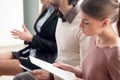 Young people waiting for job interview, audition or training ind Royalty Free Stock Photo