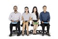 Young people waiting for a job interview on studio Royalty Free Stock Photo