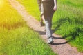 Young people walking along a rural farm track Royalty Free Stock Photo