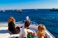 Young people on white yacht looking on Red sea Royalty Free Stock Photo