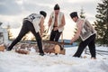 Young people wood workers in traditional costume from Bucovina Romania , farm and shepherd house workers.