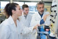 young people working in robotics classroom Royalty Free Stock Photo