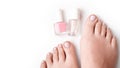 Young perfect groomed womans feet on white background. Care about nails