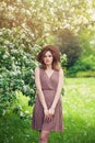 Young perfect woman with brown shoulder-length hair haircut. Beautiful model girl in summer dress and fedora hat Royalty Free Stock Photo