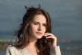 Young perfect woman outdoors, romantic portrait. Beautiful female face close up Royalty Free Stock Photo