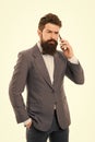 Young perfectionist. man speak on phone. business communication. Agile business. mature man. success deal. Business talk Royalty Free Stock Photo