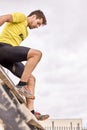 Young person going through an obstacle course in a Spartan race