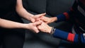 Young person holding hands of an elderly woman Royalty Free Stock Photo