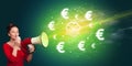 Young person with megaphone and currency icon Royalty Free Stock Photo