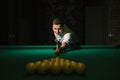 Balls and Snooker Player, man playing pool Royalty Free Stock Photo