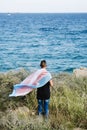 Young person with a transgender pride flag Royalty Free Stock Photo