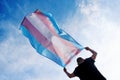 Young person with a transgender pride flag Royalty Free Stock Photo