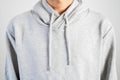 Young person wear gray hoodie, sweatshirt mockup, isolated on white background.