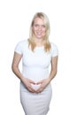 Young Petty Natual Beauty Pregnant Woman Shows a Belly That Begins to Grow Isolated on White Background.
