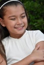 Young Philippina Juvenile And Happiness Closeup