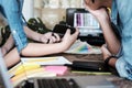 Young photographer and graphic designer at work in studio office Royalty Free Stock Photo