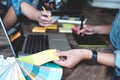 Young photographer and graphic designer at work in studio office Royalty Free Stock Photo