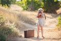 Young photographer with old camera on a country road Royalty Free Stock Photo