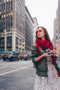 Young photographer with a retro camera in New York City Royalty Free Stock Photo