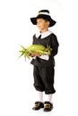 A Young Pilgrim's Thanksgiving Offering Royalty Free Stock Photo