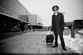 Young pilot with baggage in Kastrup airport