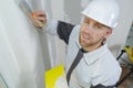 Young plasterer at work Royalty Free Stock Photo