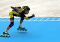 Young player on the roller skating track