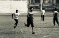 Young players running in a field