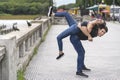 Young playful couple back to back Royalty Free Stock Photo