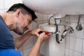 Plumber Fitting Sink Pipe Royalty Free Stock Photo