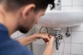 Plumber Fitting Sink Pipe Royalty Free Stock Photo