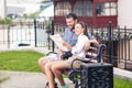 Young Positive Caucasian Couple Travelling Across the City.