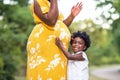 Portrait of a beautiful African American Pregnant Woman