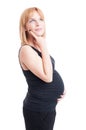 Young and pregnant blonde woman thinking and wondering gesture Royalty Free Stock Photo