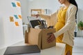 Pregnant businesswoman packing her things in box Royalty Free Stock Photo