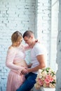 Young pregnant couple awaiting baby. Happy and healthy pregnancy Royalty Free Stock Photo