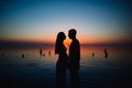 Young pregnant couple in love at sunset Royalty Free Stock Photo