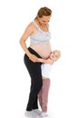 Young pregnant woman with daughter. Royalty Free Stock Photo