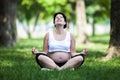 Young pregnant woman doing yoga exercises Royalty Free Stock Photo