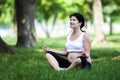 Young pregnant woman doing yoga exercises Royalty Free Stock Photo
