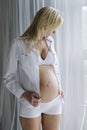 Young pregnant woman with her unborn child Royalty Free Stock Photo