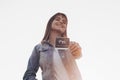 Young Pregnant Woman holding ultrasound photo at Sunset and Embracing her Belly. 4 Month Pregnancy. Maternity Concept. Toned Photo Royalty Free Stock Photo