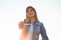 Young Pregnant Woman holding ultrasound photo at Sunset and Embracing her Belly. 4 Month Pregnancy. Maternity Concept. Toned Photo Royalty Free Stock Photo